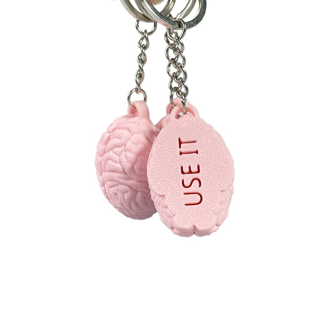 3D printed pink funny brain keychain