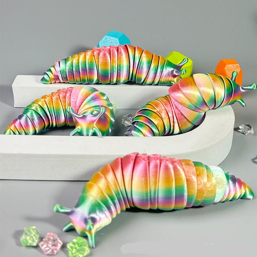 Colorful caterpillar-shaped toys on a gray background