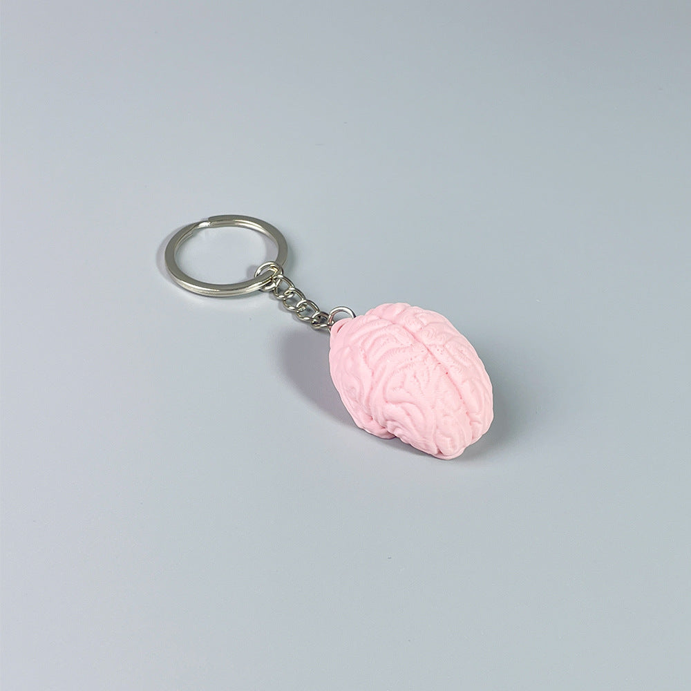 3D printed pink funny brain keychain