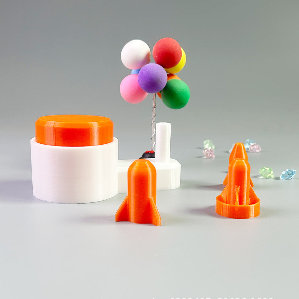 Colorful balloon arrangement with a white vase on a gray background