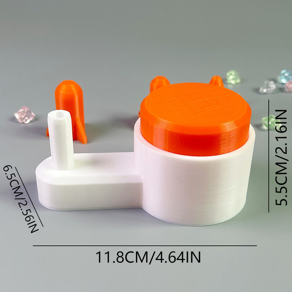 White and orange plastic tool with measurements on a gray background
